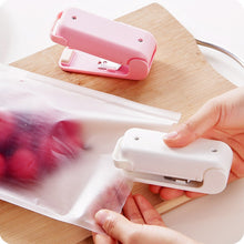 Load image into Gallery viewer, Mini Colorful Portable Handheld Household Electronic Mini Heat Sealing Machine Plastic Food Snacks Bag Packing Sealer Tools
